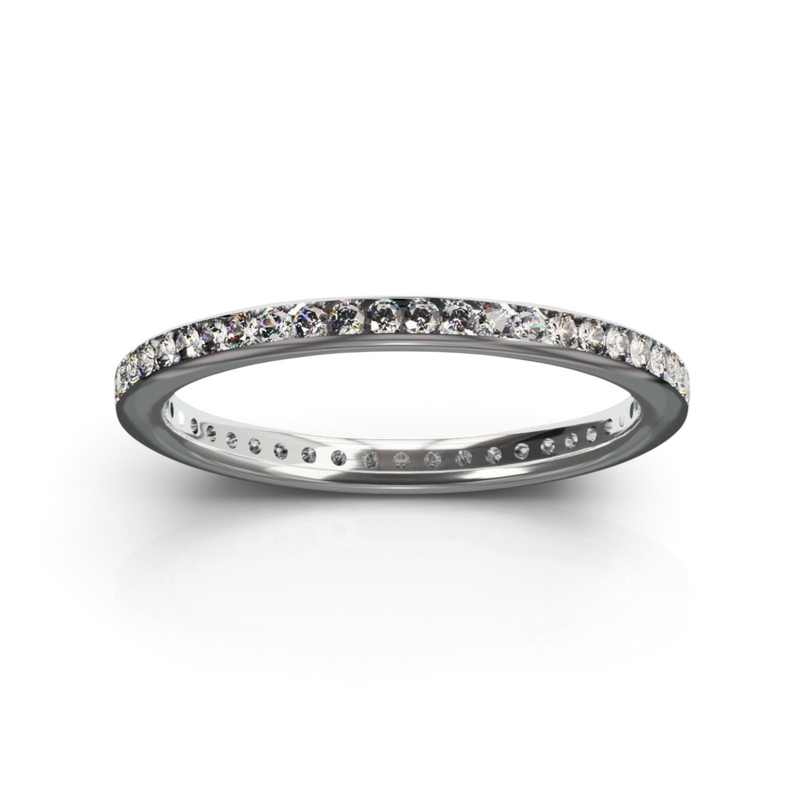 YFS Designs Zenith channel set eternity band featuring 1.3mm round lab-grown diamonds in polished 14K white gold