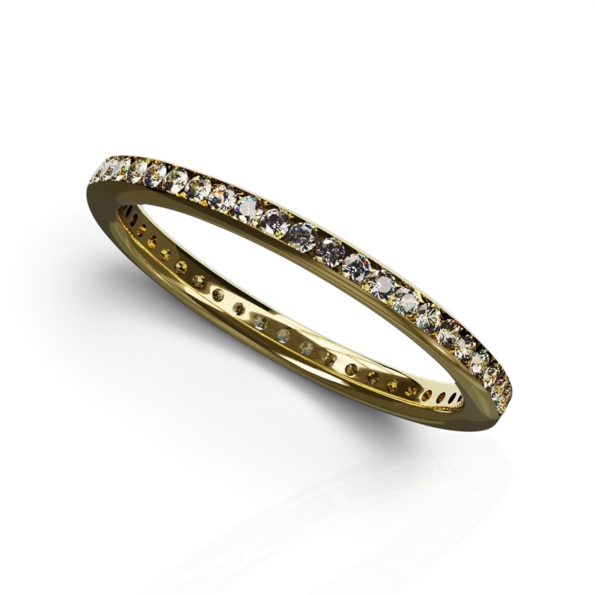 YFS Designs Zenith gold band featuring 1.3mm channel set lab-grown round diamonds in a delicate eternity style.