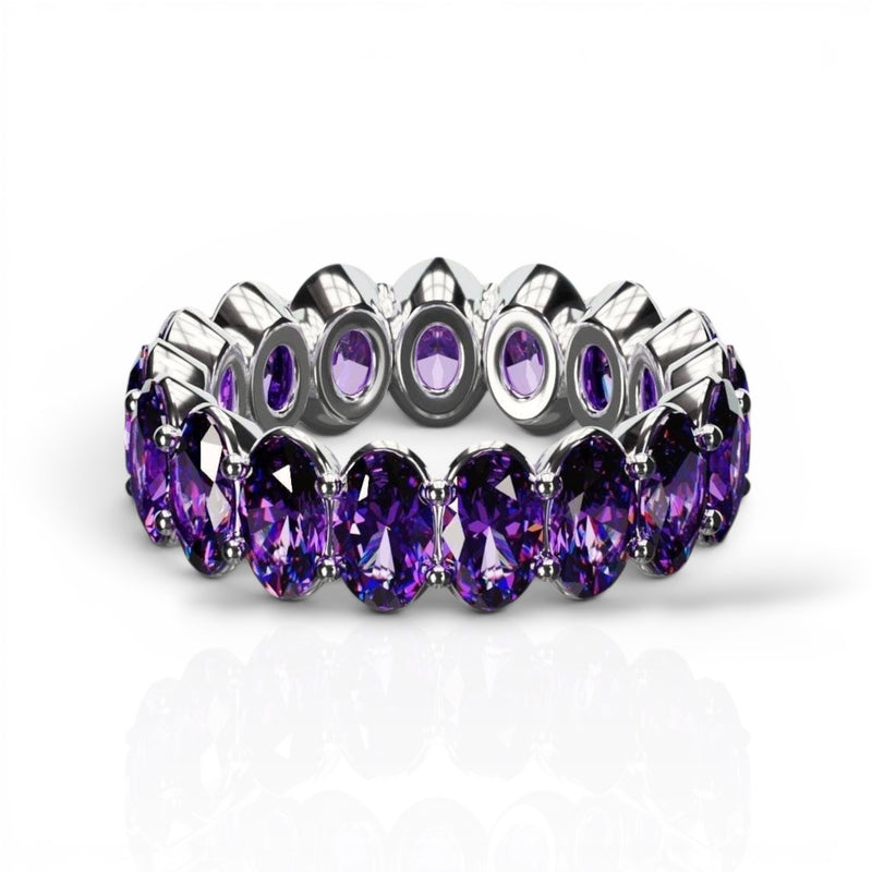 Natural oval cut amethyst ring with 3x5mm stones in silver setting