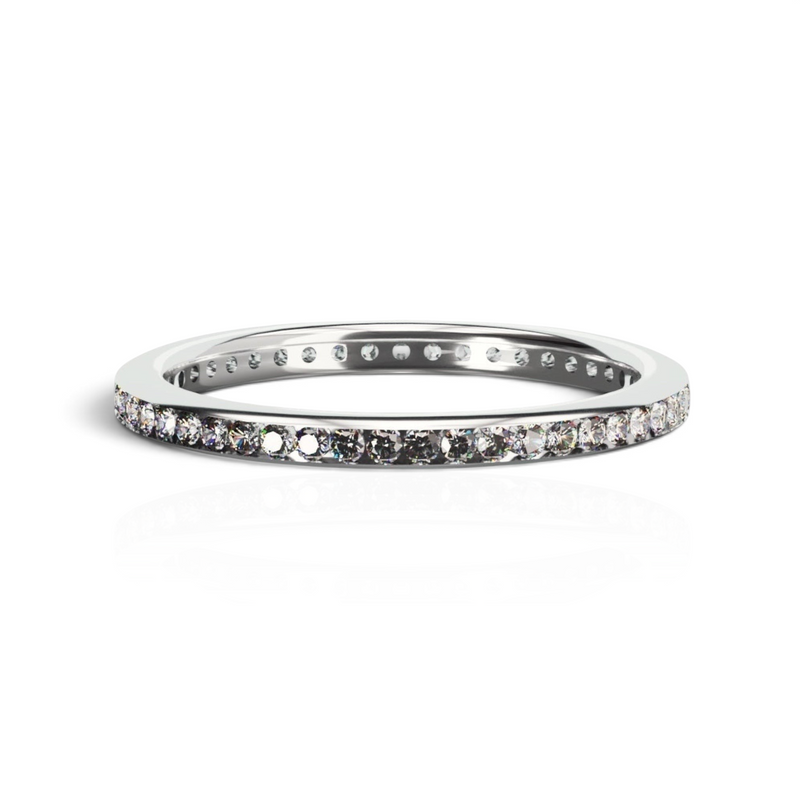 YFS Designs Zenith channel set eternity band featuring 1.3mm round lab diamonds in polished 14K white gold