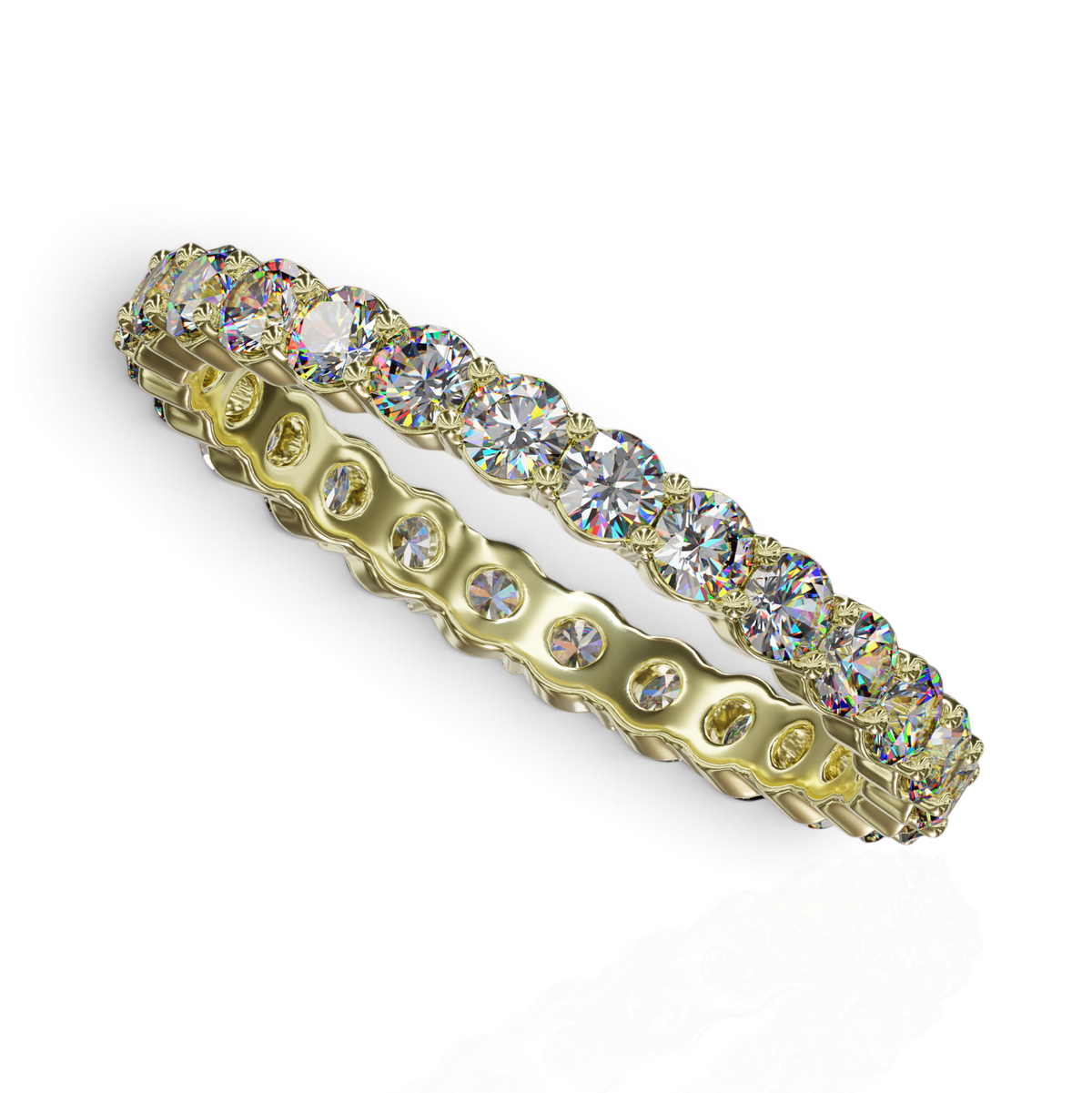 YFS Designs 2.5mm gold eternity band featuring a continuous row of sparkling lab-grown round diamonds in shared prongs.