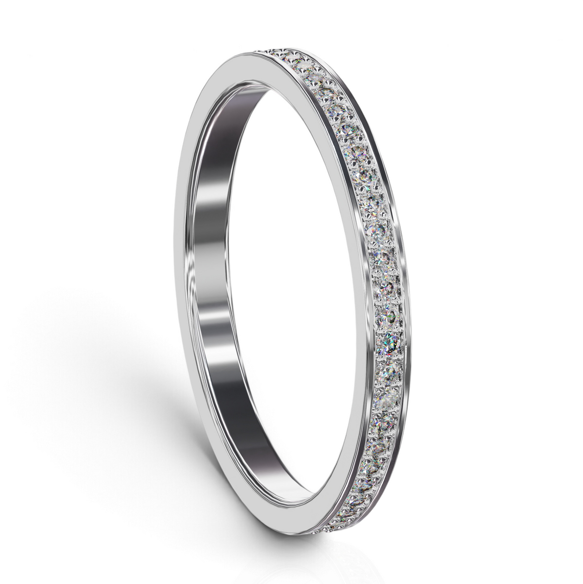 YFS Designs Fira eternity band in 14K white gold with 0.26ct lab-grown round diamonds in a channel prong setting.