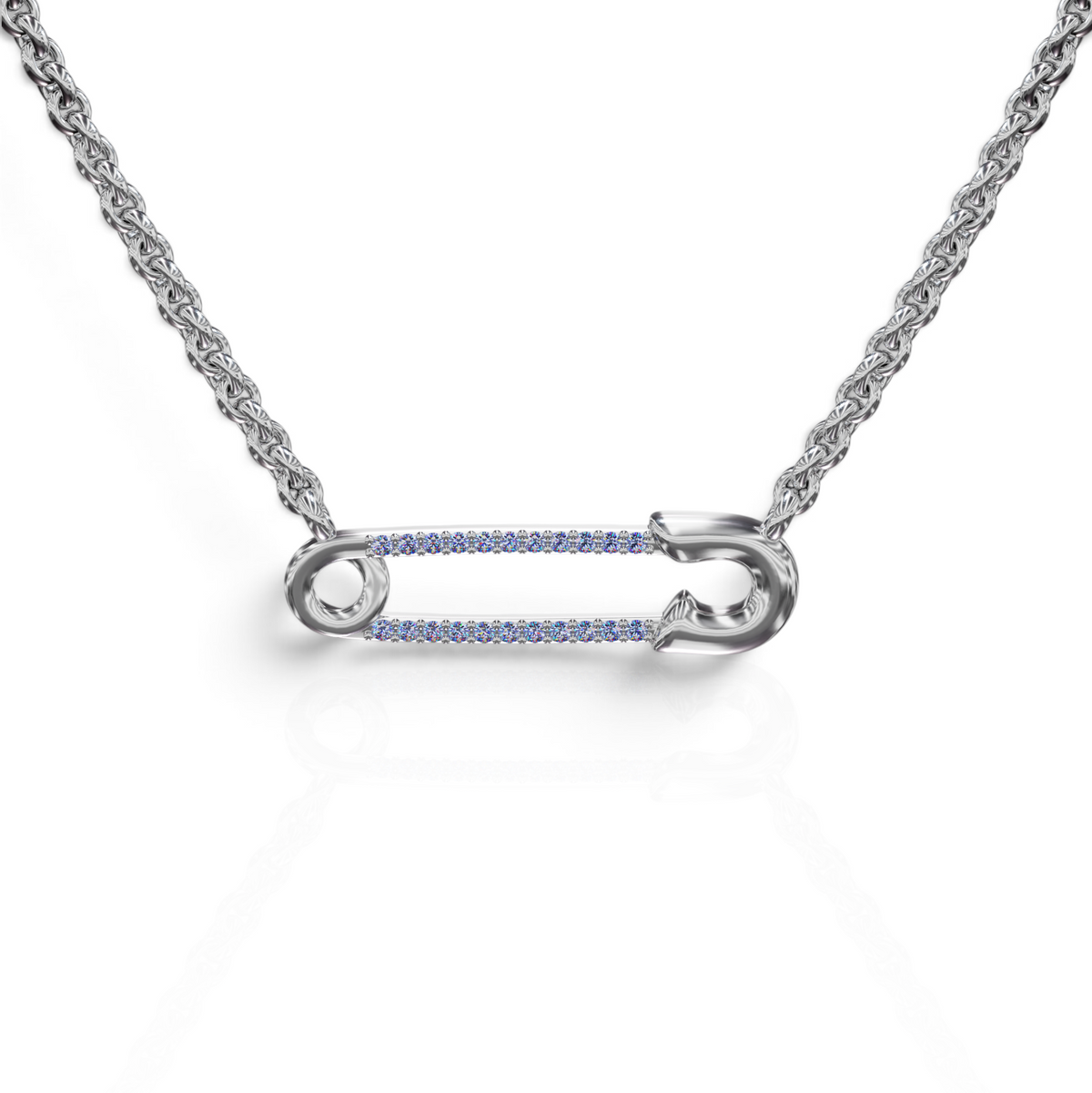 YFS Designs safety pin necklace featuring natural tanzanite gemstones on a silver cable chain