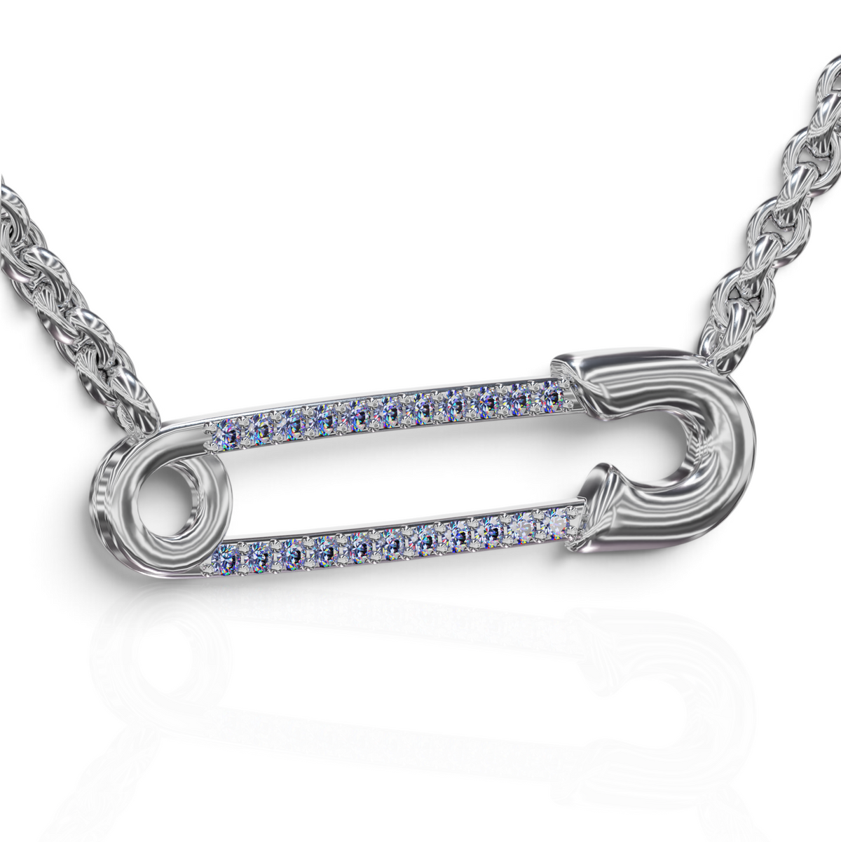 YFS Designs safety pin necklace featuring 1mm natural tanzanite gemstones set on a silver cable chain.