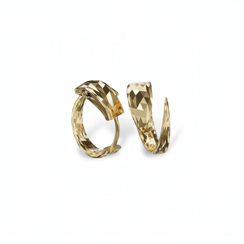YFS Designs gold snake huggie earrings with faceted texture and moissanite stone accents.