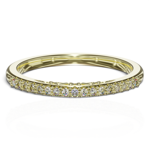 YFS Designs Mariela gold wedding band with a row of shimmering diamonds and intricate filigree side scrollwork.