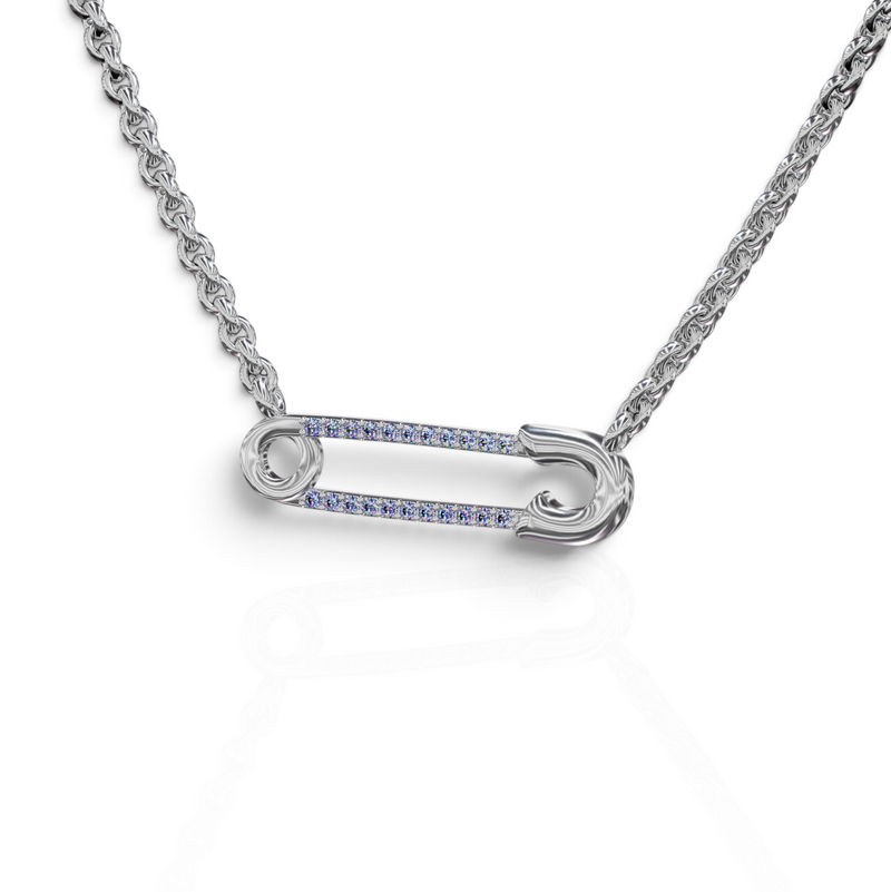 YFS Designs safety pin necklace featuring natural tanzanite gemstones on a silver cable chain