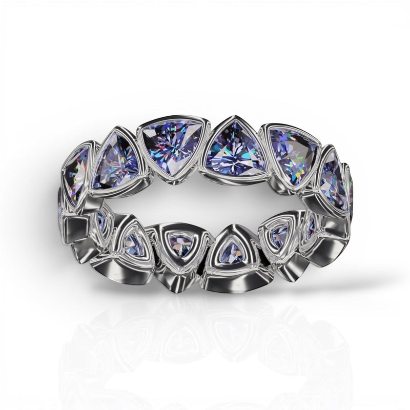 YFS Designs 4mm trillion faceted tanzanite bezel set eternity band in polished silver