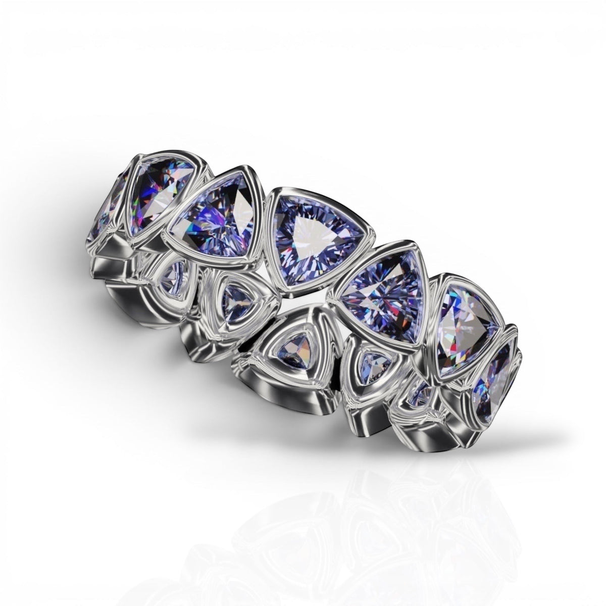 YFS Designs 4mm trillion faceted tanzanite gemstone bezel band in polished silver metal